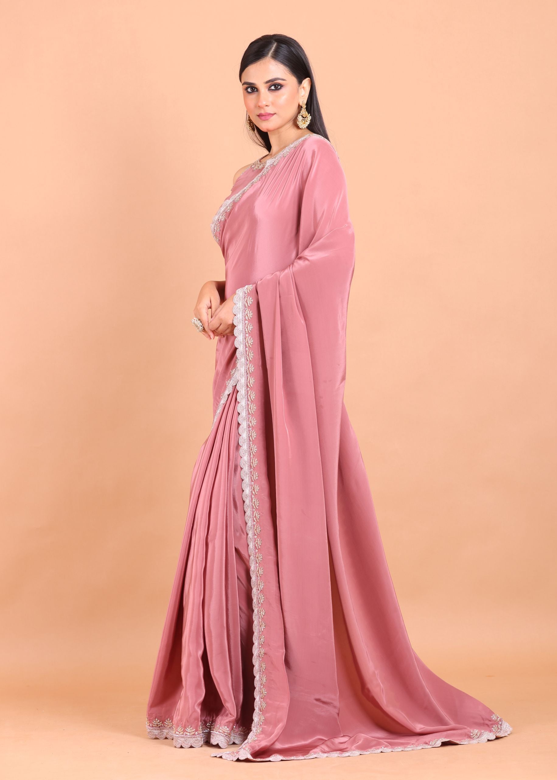 Dusky Rose Pink Crepe Silk Saree Blouse Set  With Golden Embroidered Border and Cutdana Work Side View