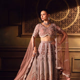 Dusty Pink Bridal Lehenga Set in Net with All Over Embroidery and Dupatta - Front