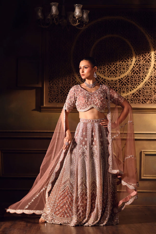 Dusty Pink Bridal Lehenga Set in Net with All Over Embroidery and Dupatta - Front