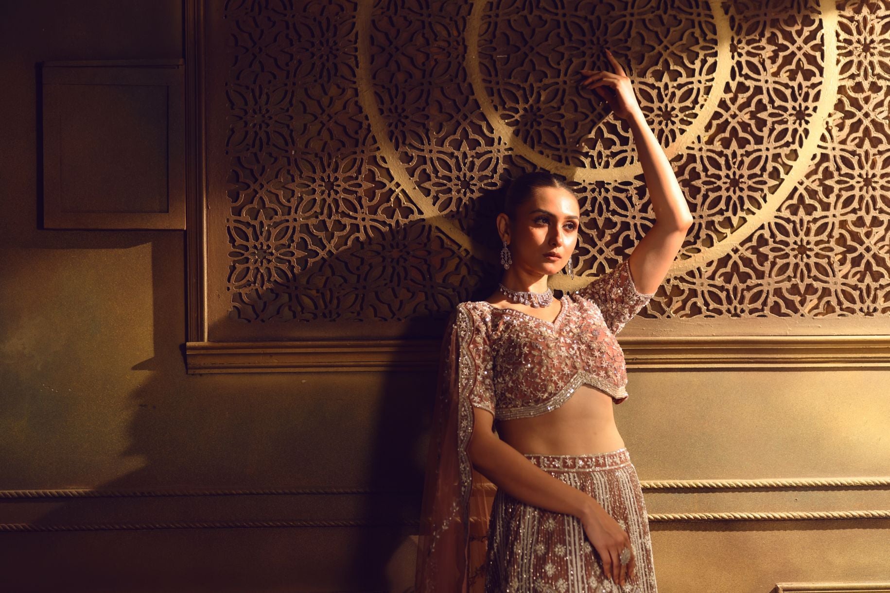 Dusty Pink Bridal Lehenga Set in Net with All Over Embroidery and Dupatta - Front Close