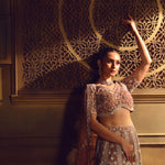 Dusty Pink Bridal Lehenga Set in Net with All Over Embroidery and Dupatta - Front Close