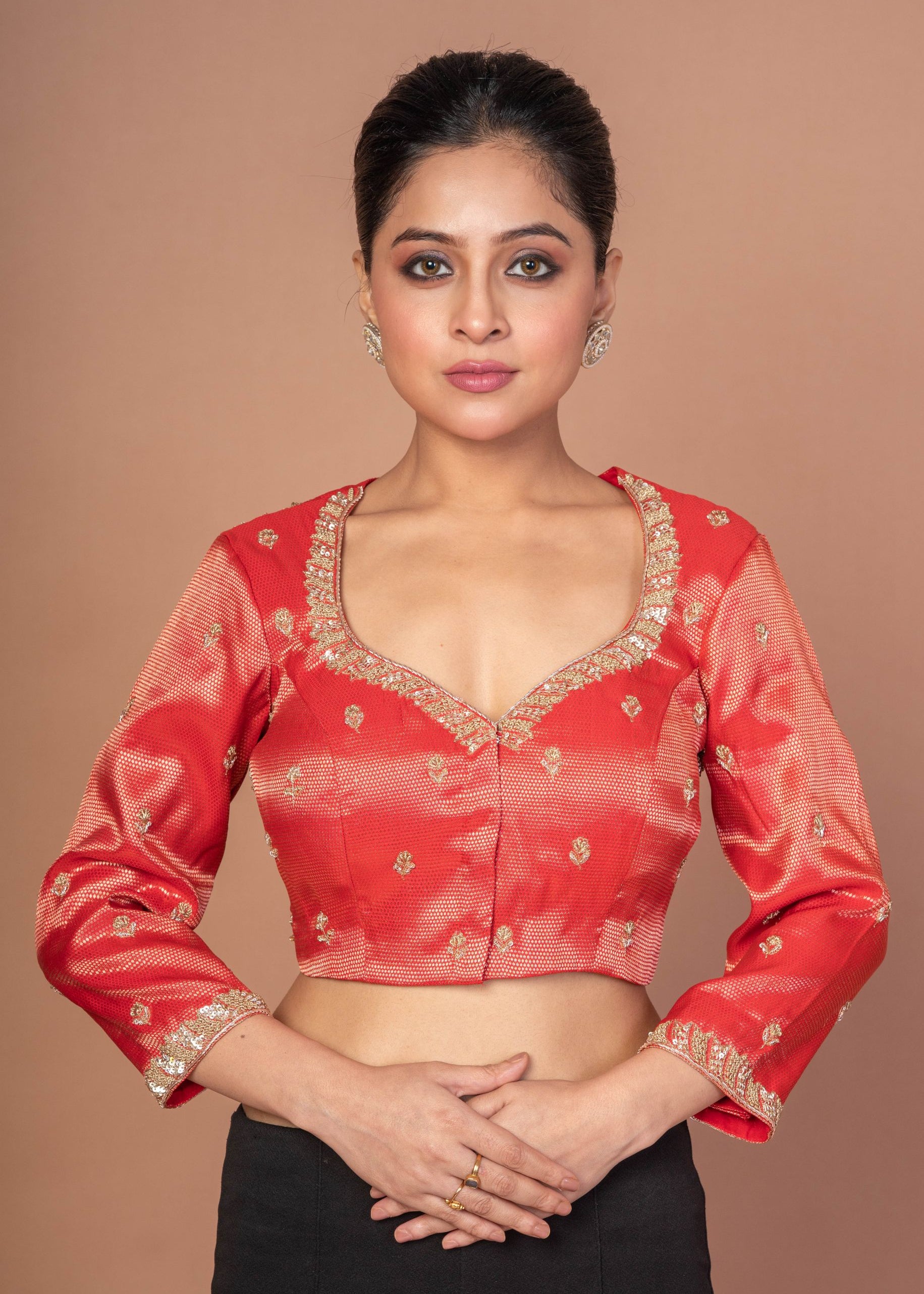  Red Tissue Blouse with Hand Embroidered Work
img 1