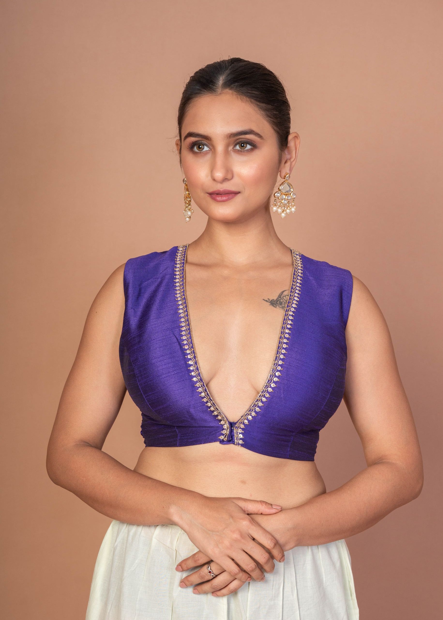 Royal Blue V Neckline Sleeveless Blouse With Embroidered Work
img 1