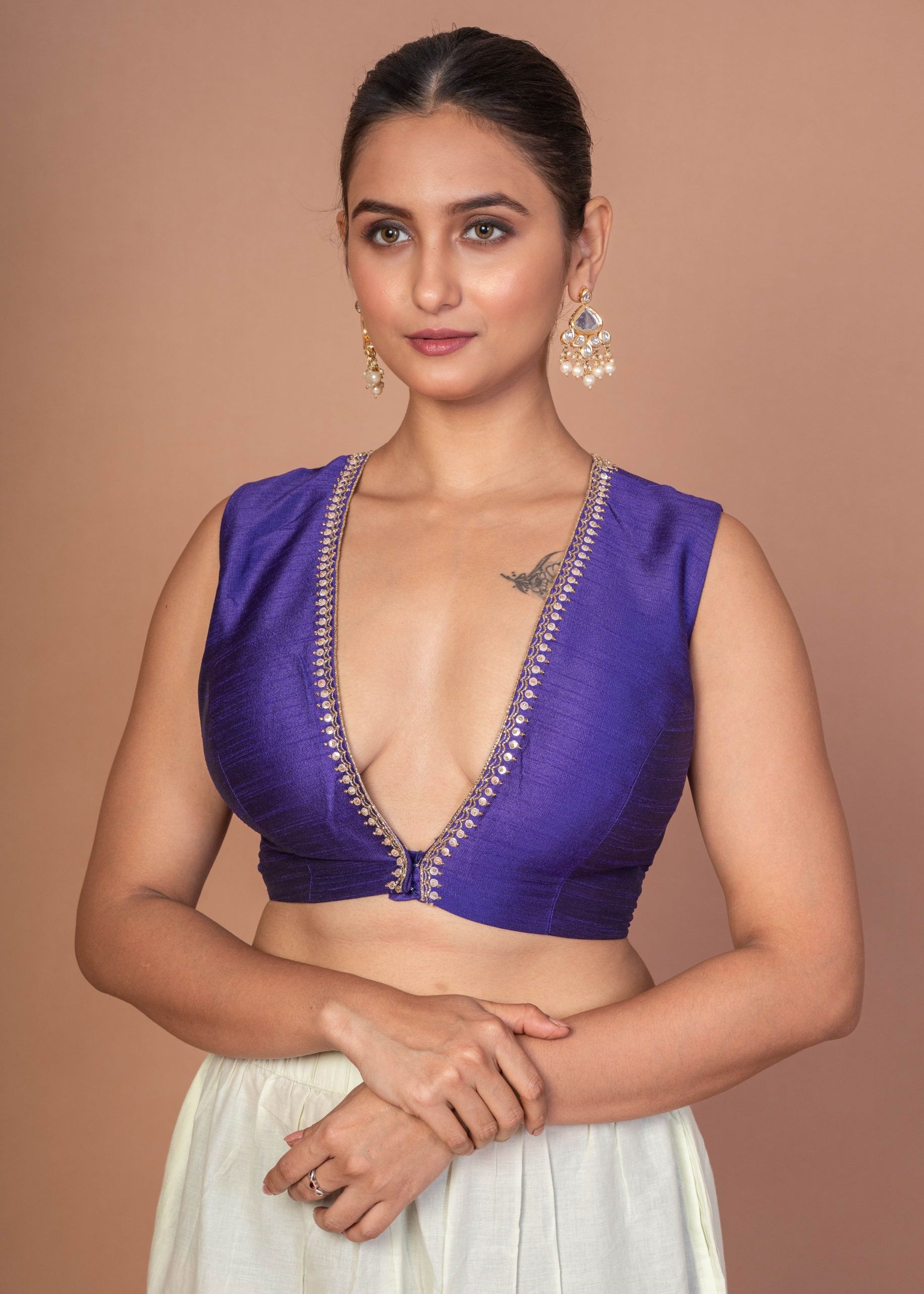 Royal Blue V Neckline Sleeveless Blouse With Embroidered Work
img 2