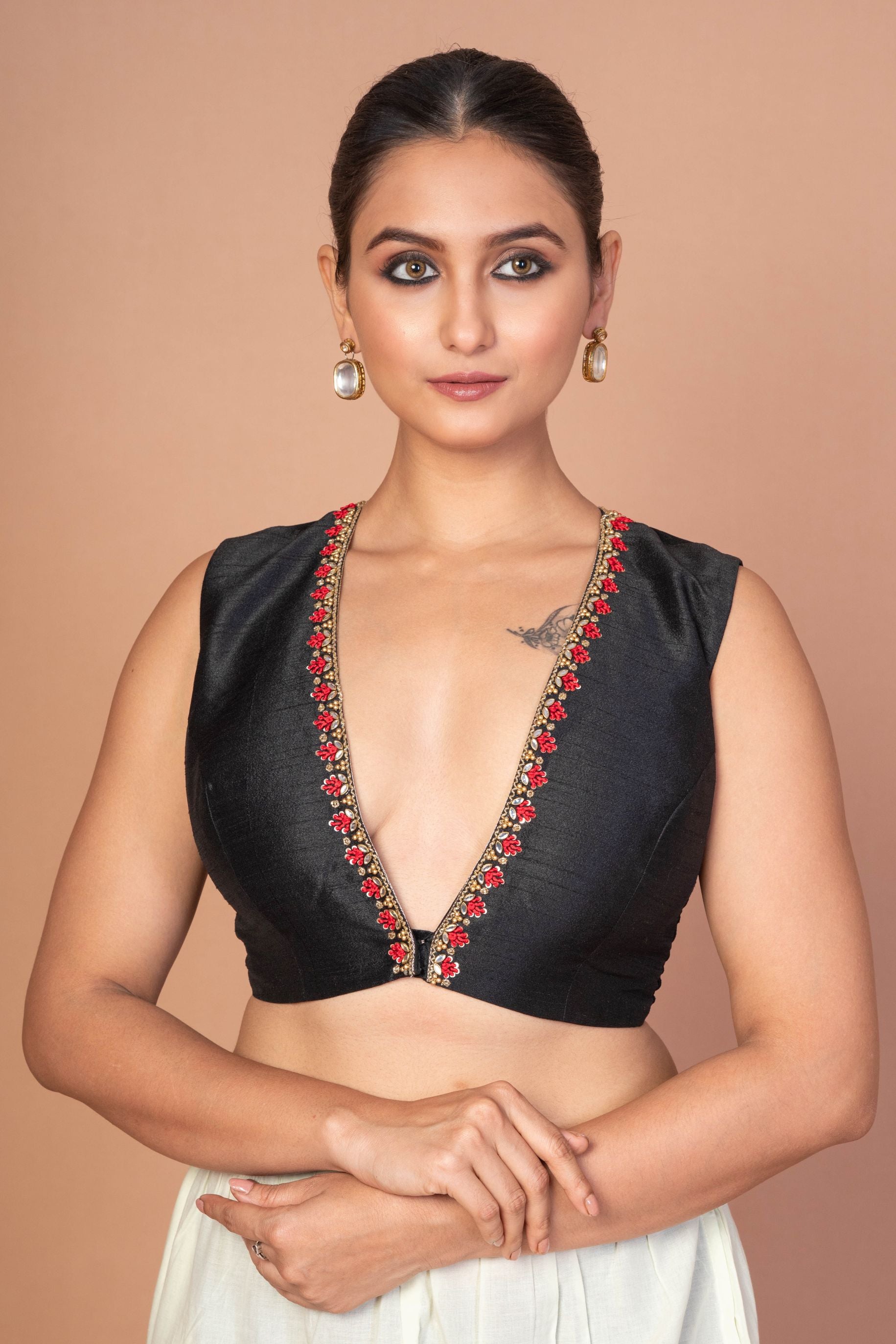 Black Raw silk Blouse With Deep V Neckline with Red And Gold Embroidered Work
img 1