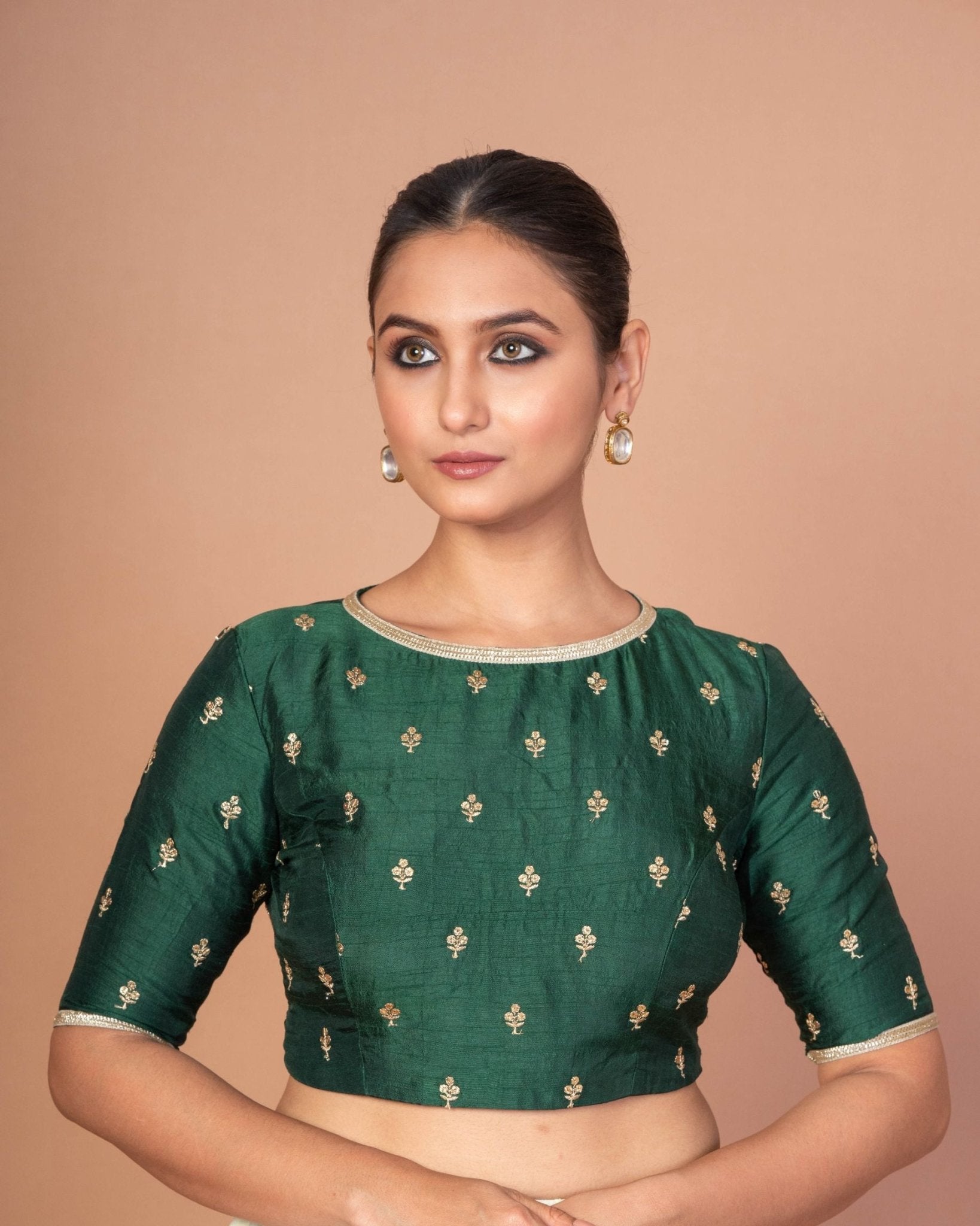 Dark Green Blouse with Golden Floral Embroidery and Boat Neckline - Anvi Couture