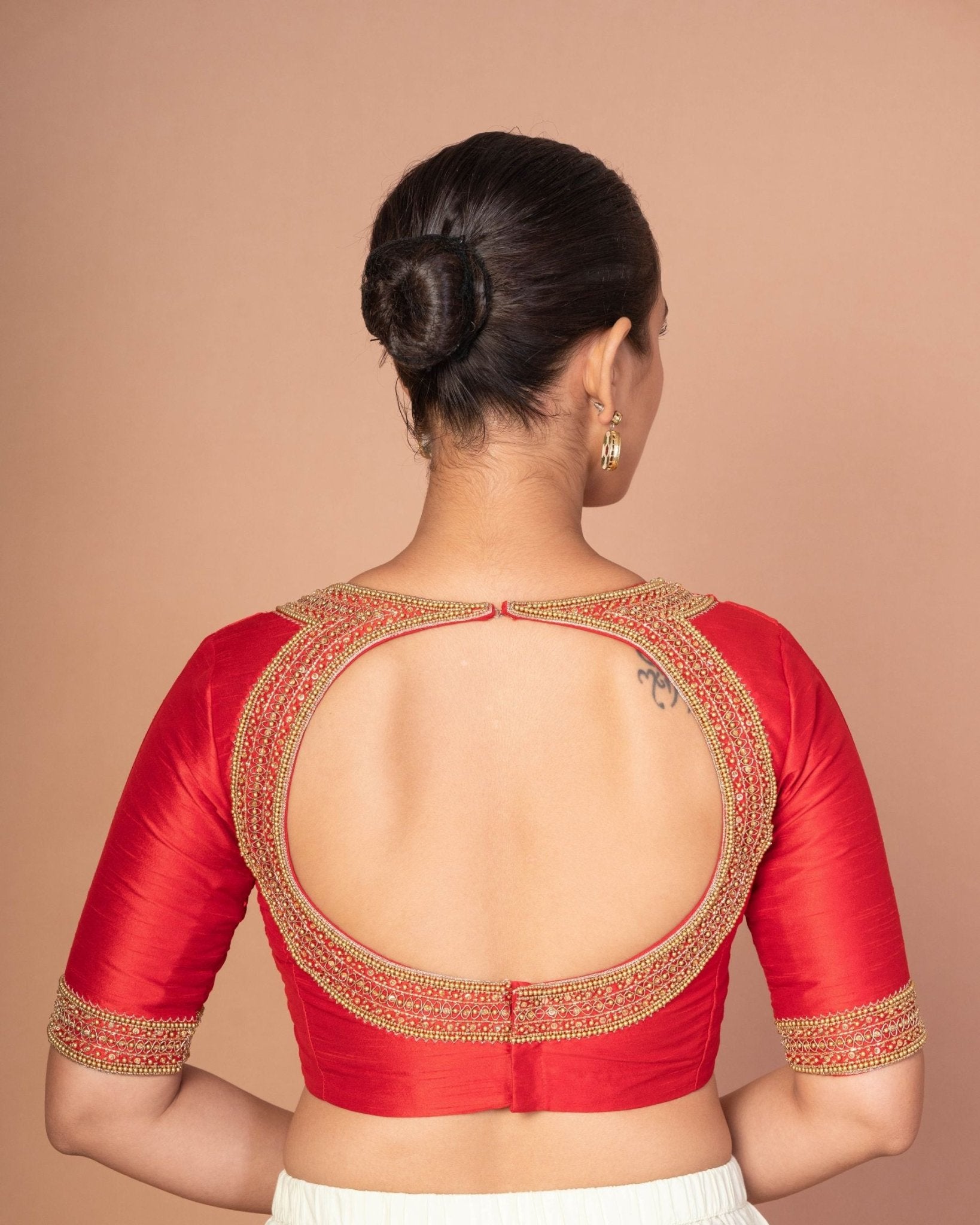Red Raw Silk Hand - Embroidered Blouse with Golden Beads & Round Back Cut - Out - Anvi Couture