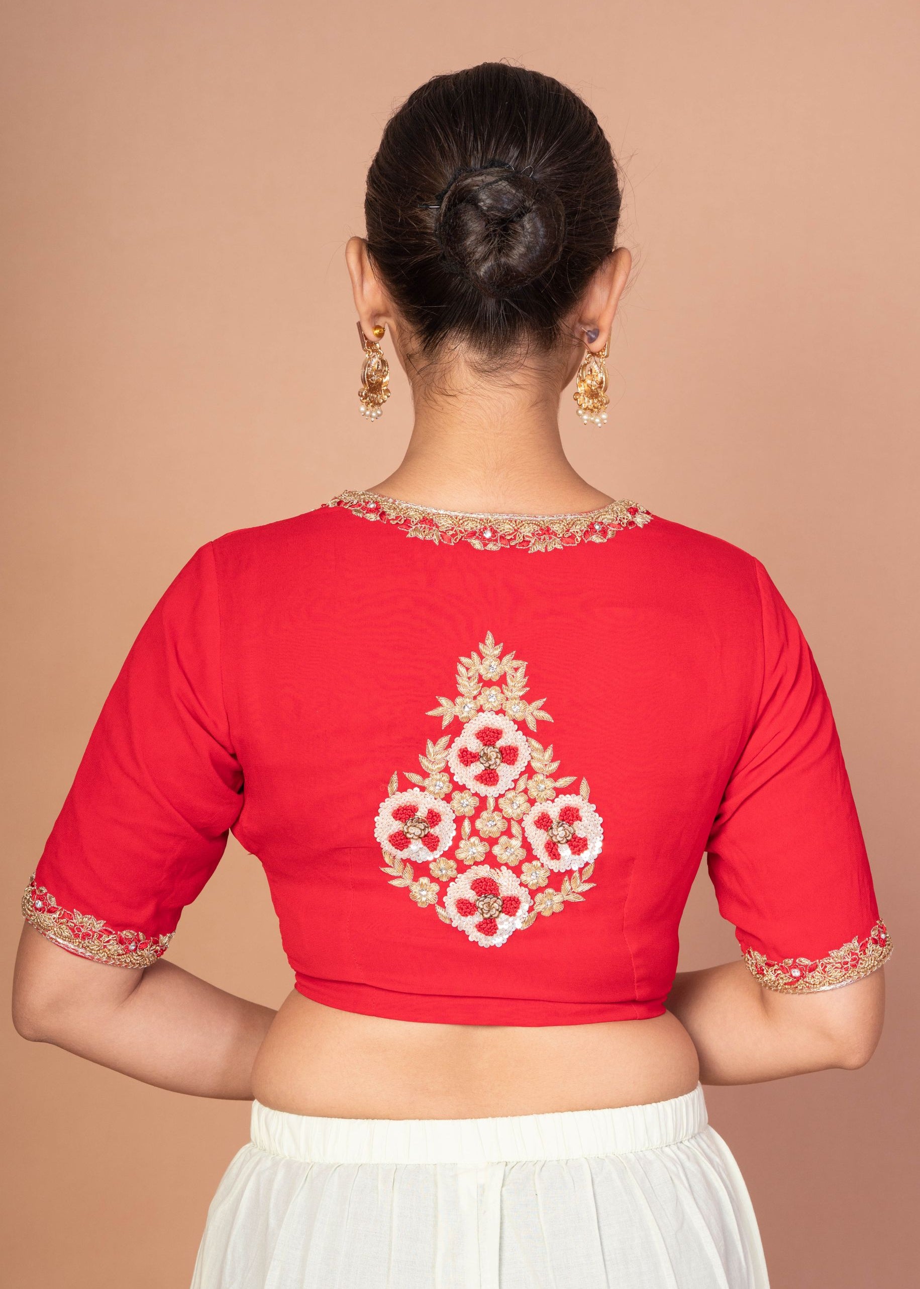 Red Hand-Embroidered Blouse with Round Neck and Back Closure
img 4