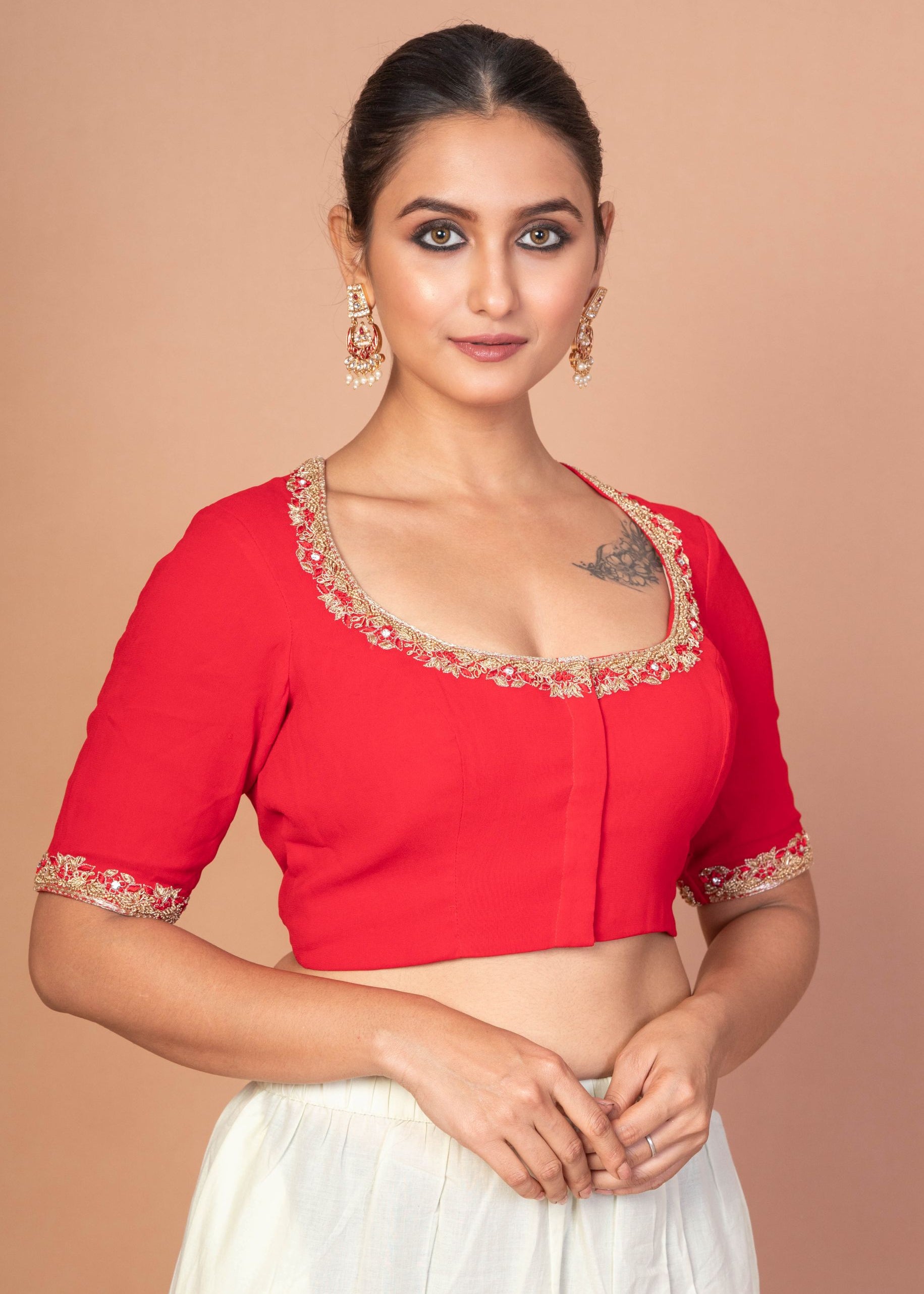 Red Hand-Embroidered Blouse with Round Neck and Back Closure
img 2