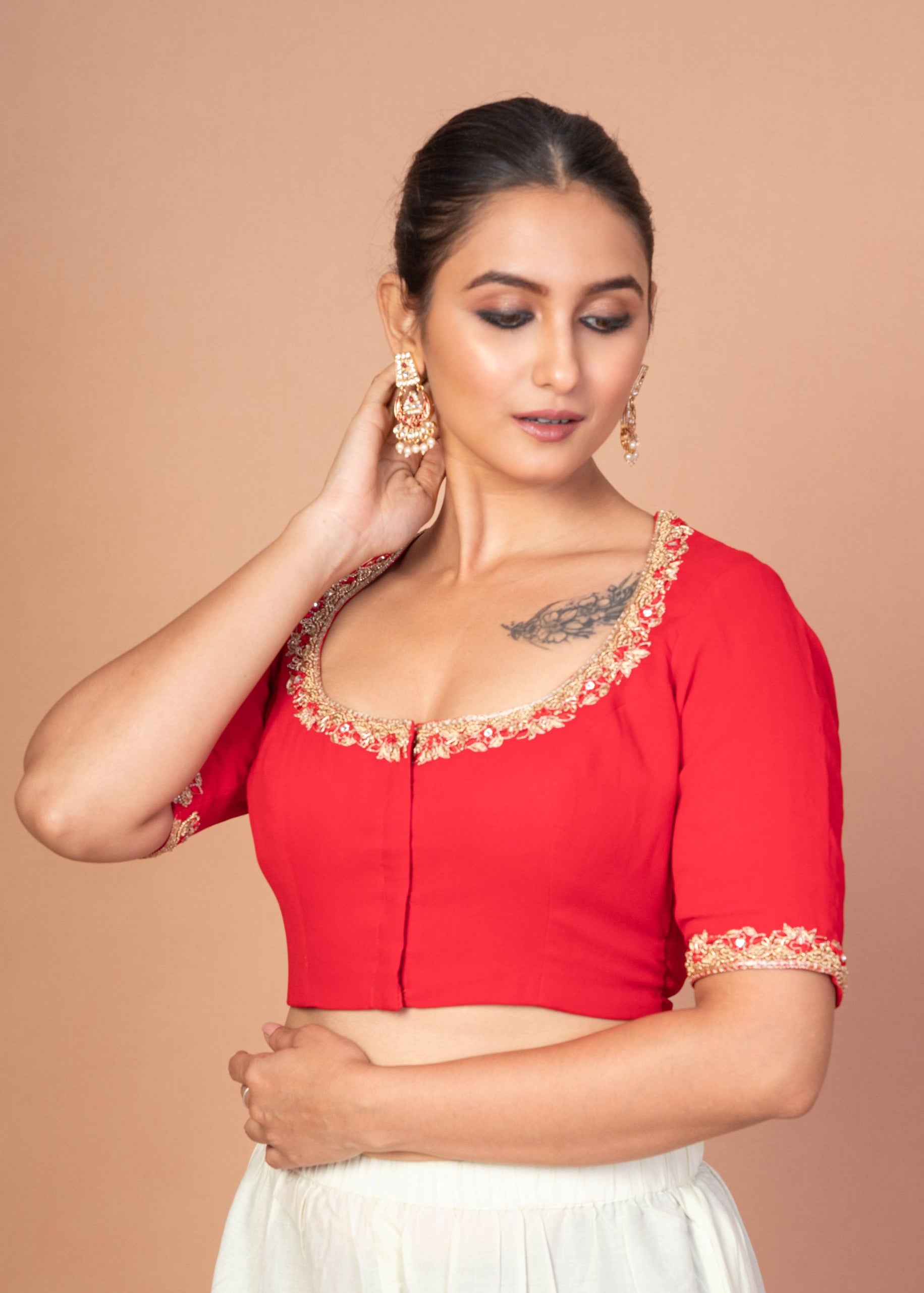 Red Hand-Embroidered Blouse with Round Neck and Back Closure
img 3