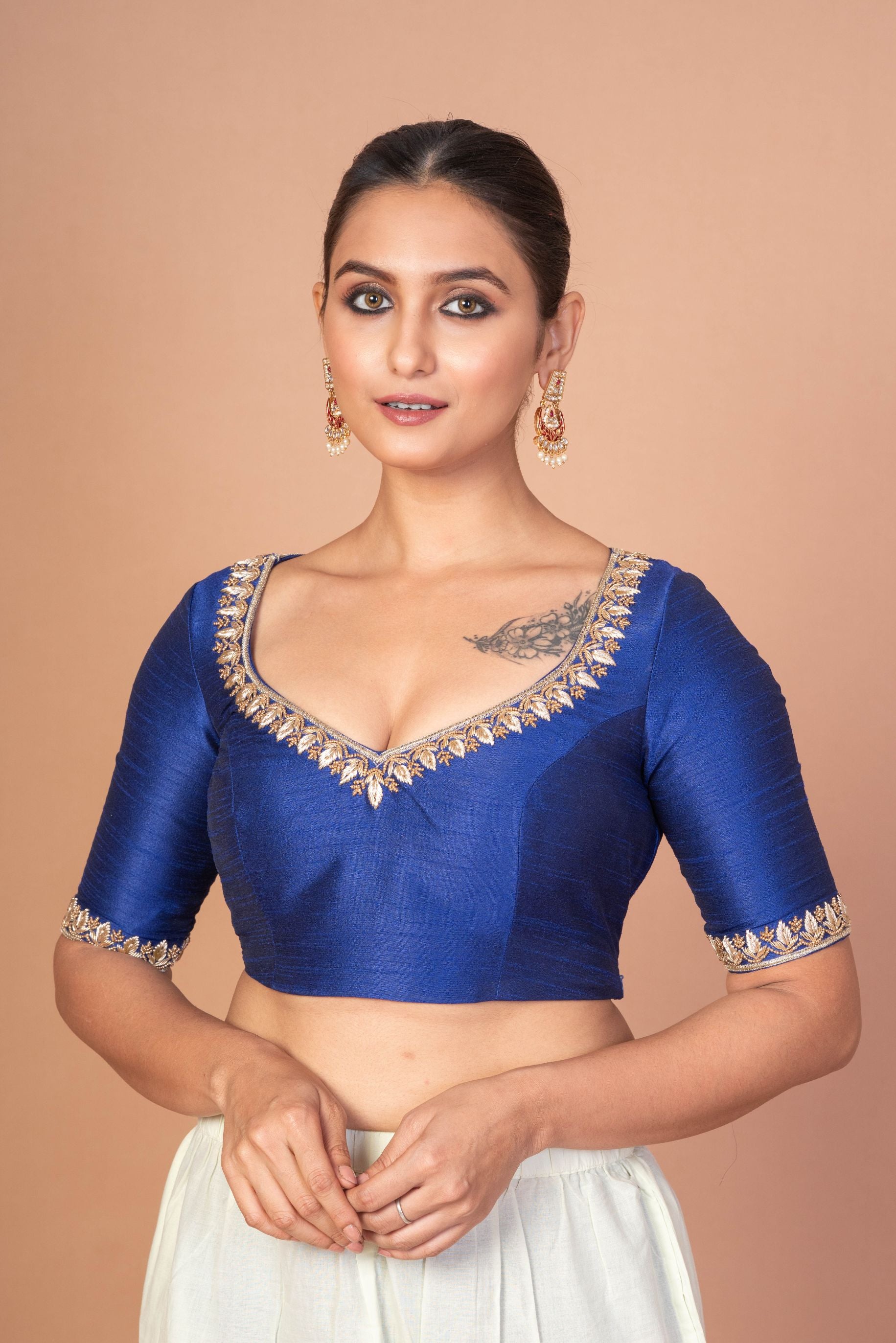 Blue Hand-Embroidered Blouse with Round Neck and Back Closure
image 4