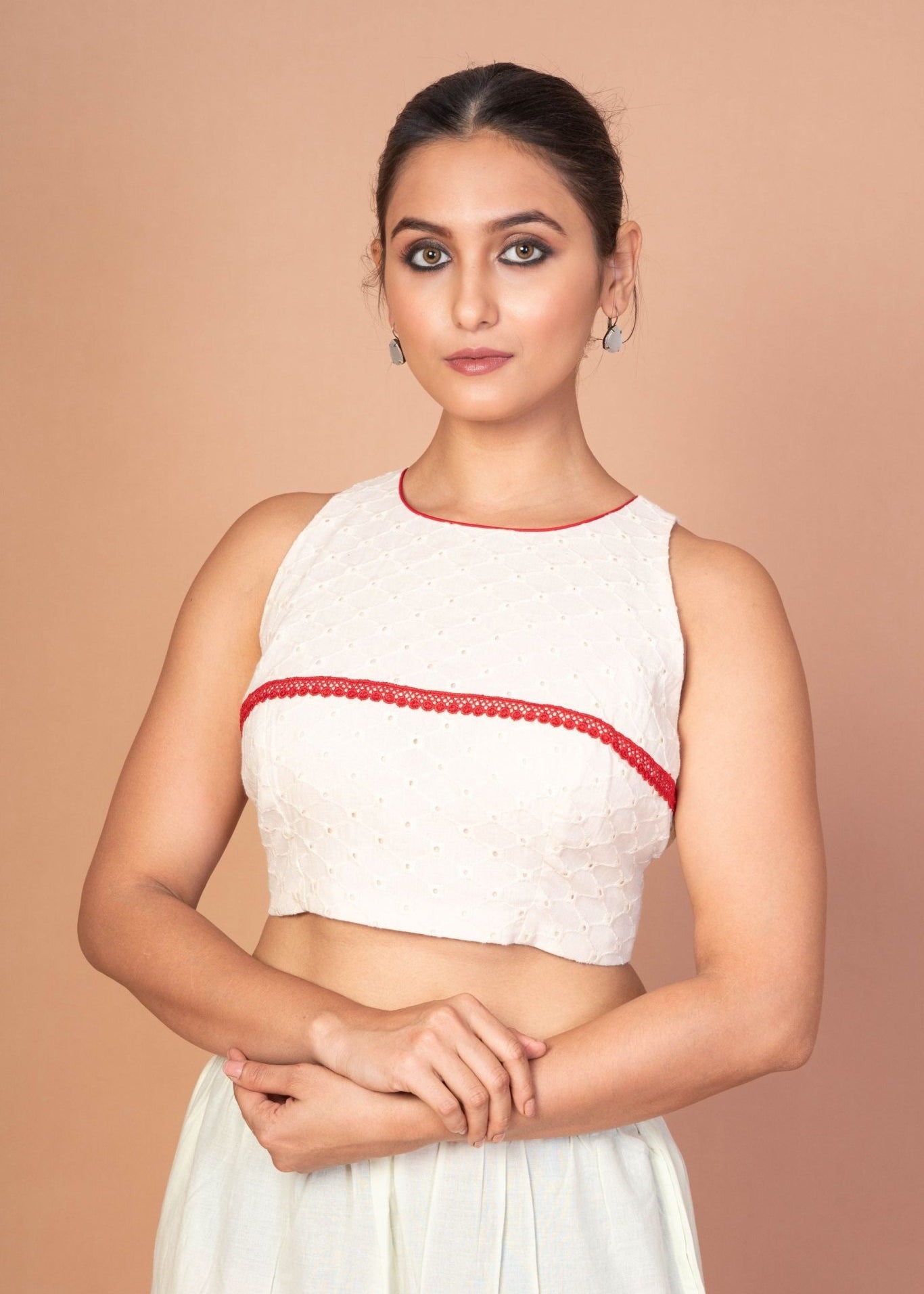 Designer White Hakoba Blouse with Sleeveless Cut and Red Lace Embroidery - Anvi Couture