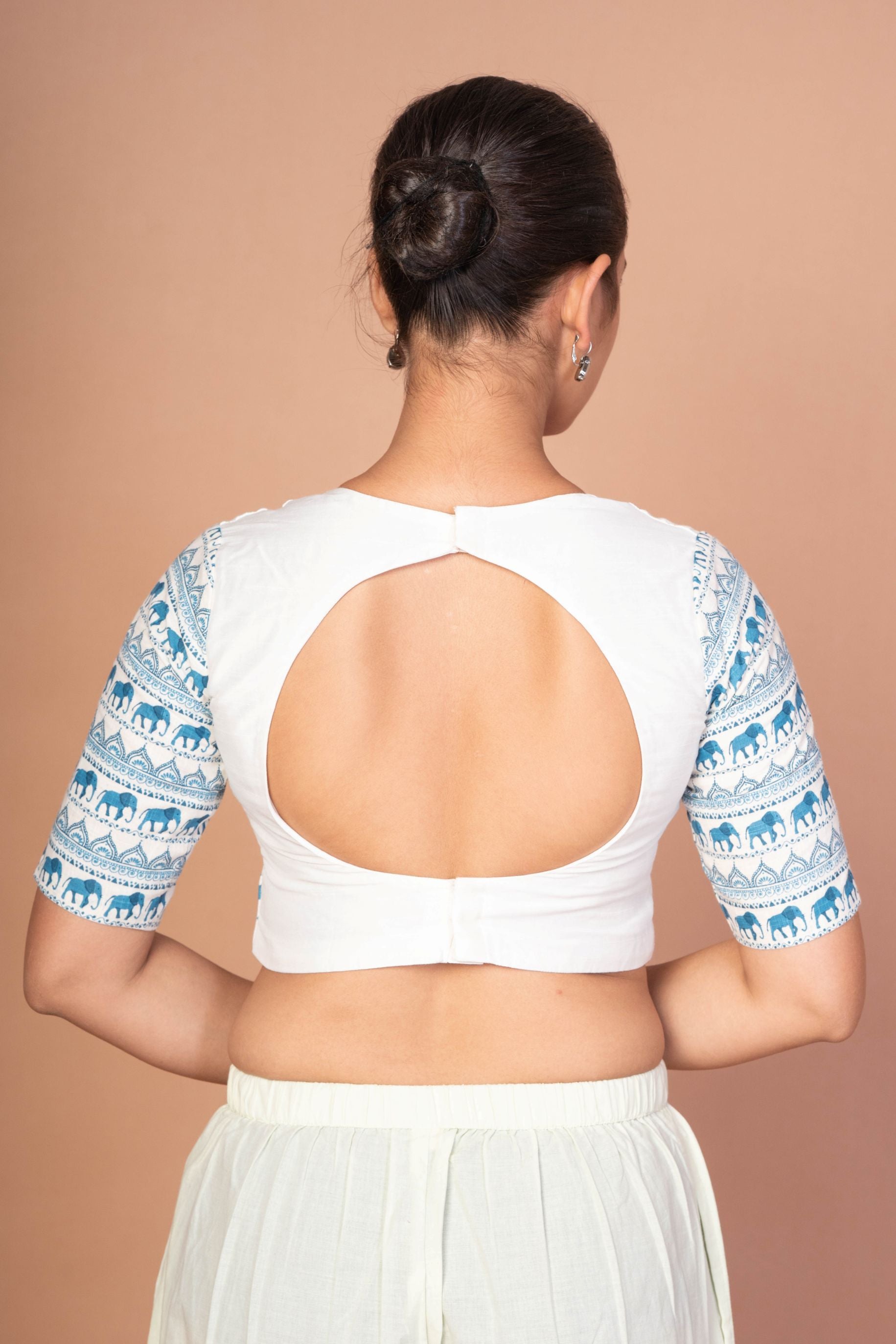  Classic White Sweetheart Neckline Blouse with Printed Blue Sleeves and Back Closure
img 4