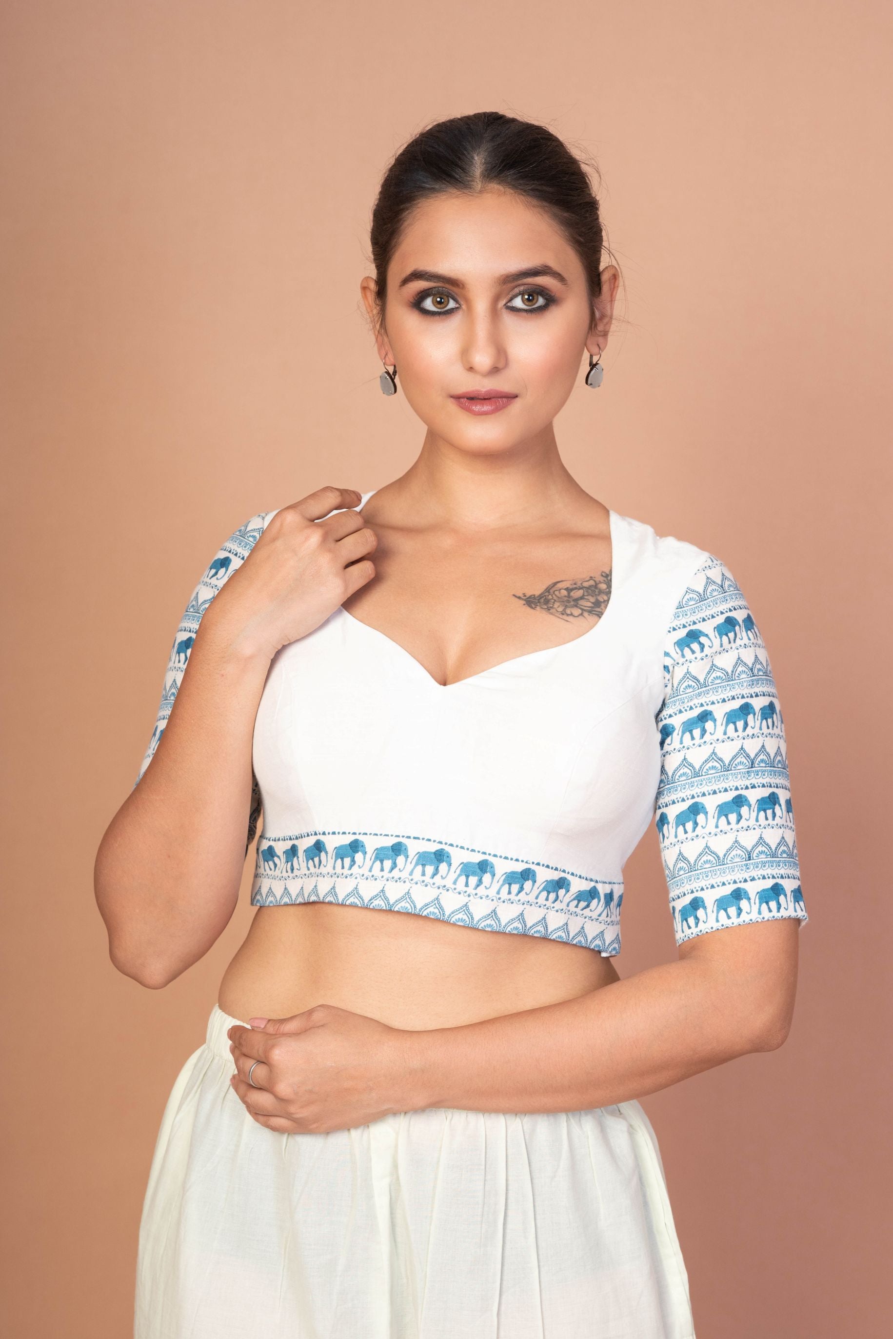  Classic White Sweetheart Neckline Blouse with Printed Blue Sleeves and Back Closure
img 3