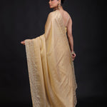 Golden Tissue Saree With Hand Embroidered Back
