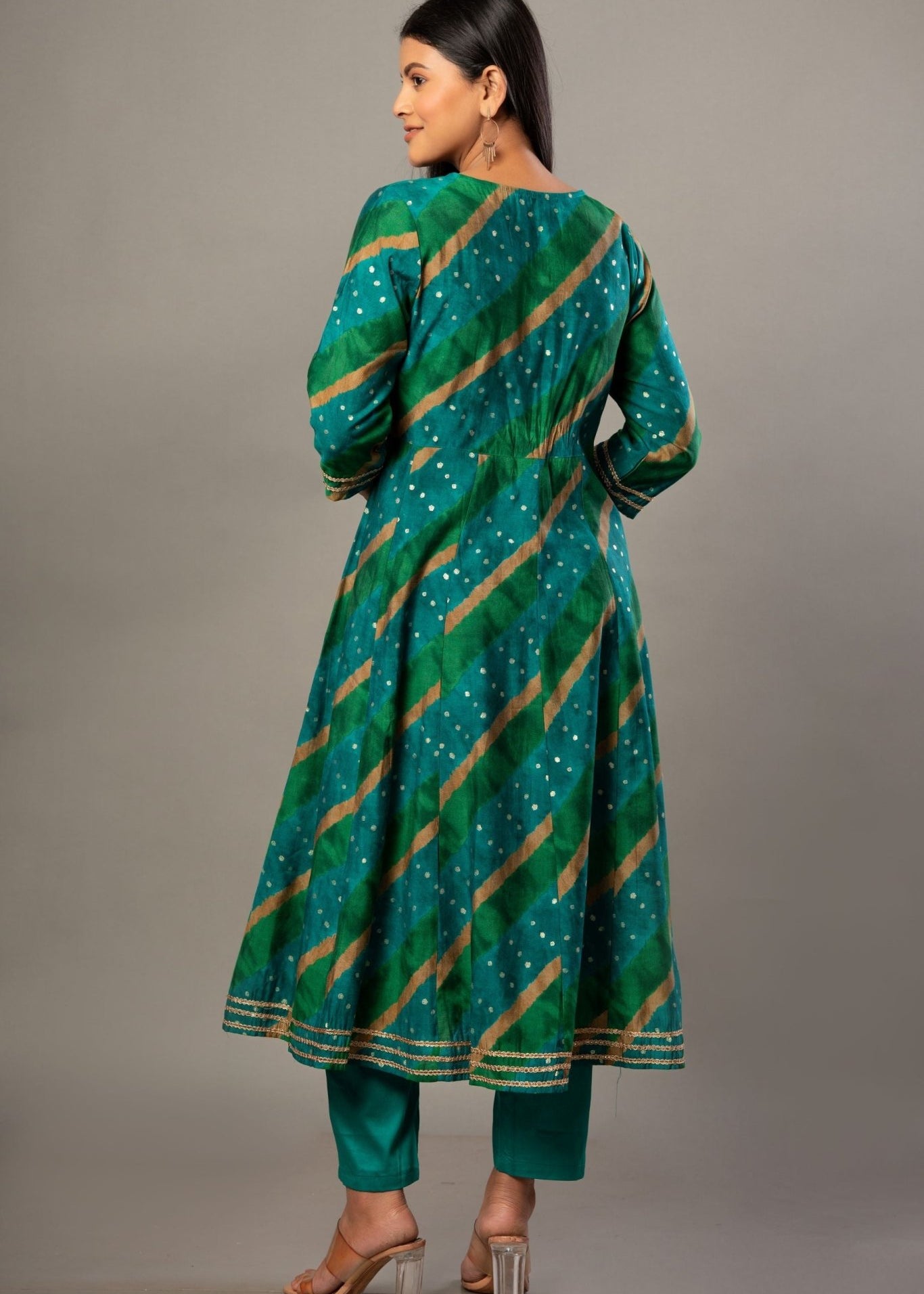 silk dress kurti Pure modal silk 3 piece cut dress kurti featuring an overlapped neck line design embellished with beads and sequin work. A perfect blend of comfort and style!This dress kurti offers a luxurious feel
