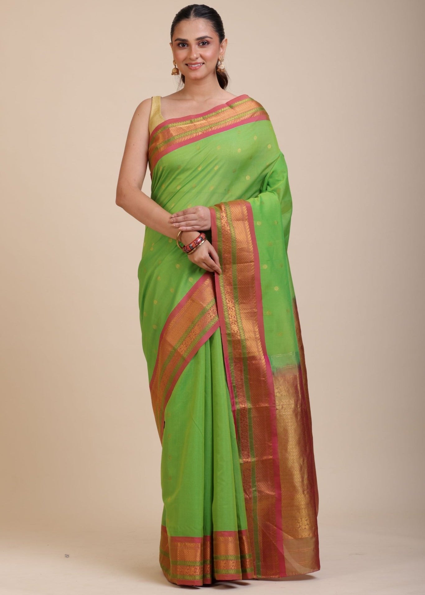 Green South Indian Silk Saree With PInk and Golden Border and Pallu - Anvi Couture