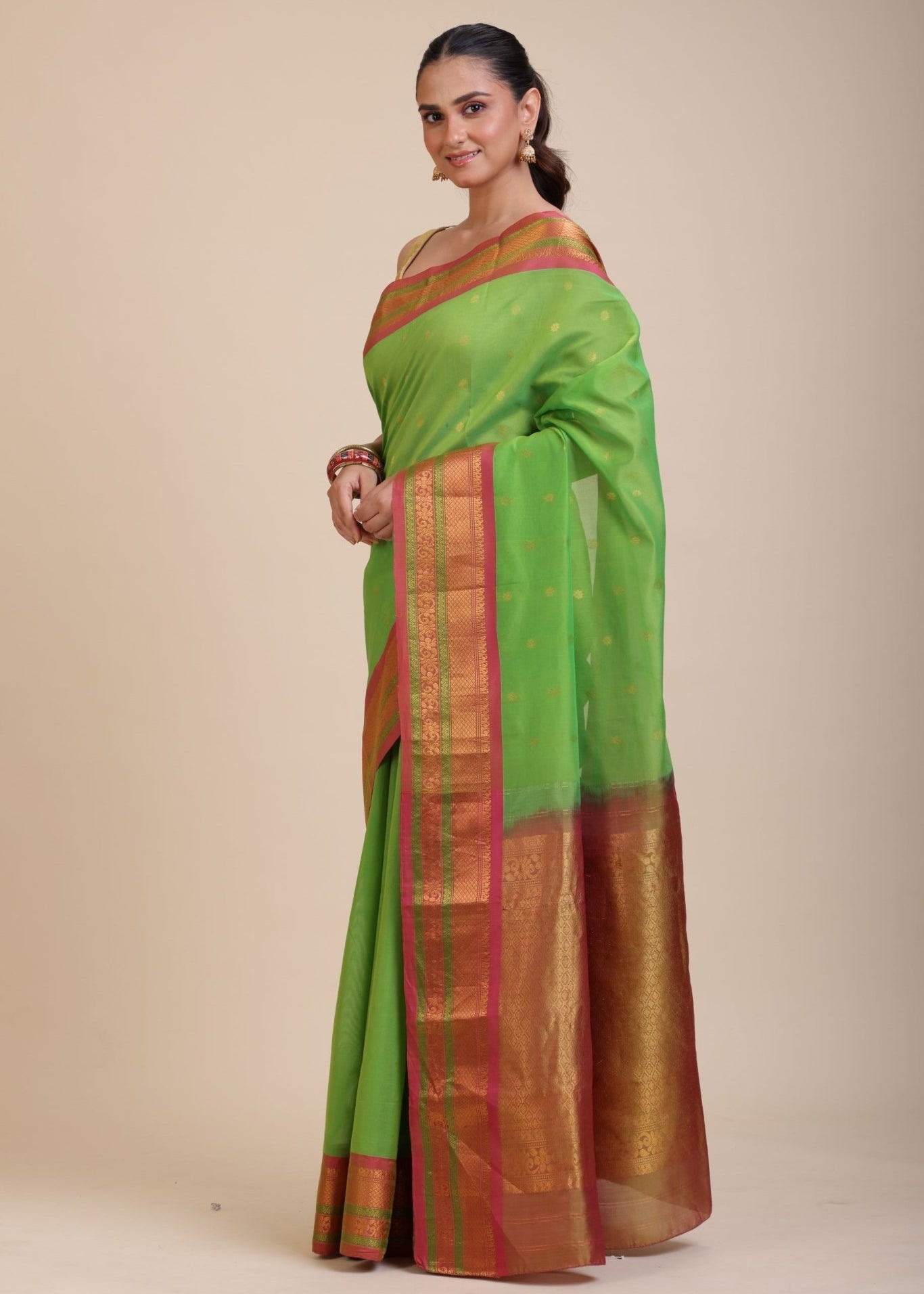 Green South Indian Silk Saree With PInk and Golden Border and Pallu - Anvi Couture