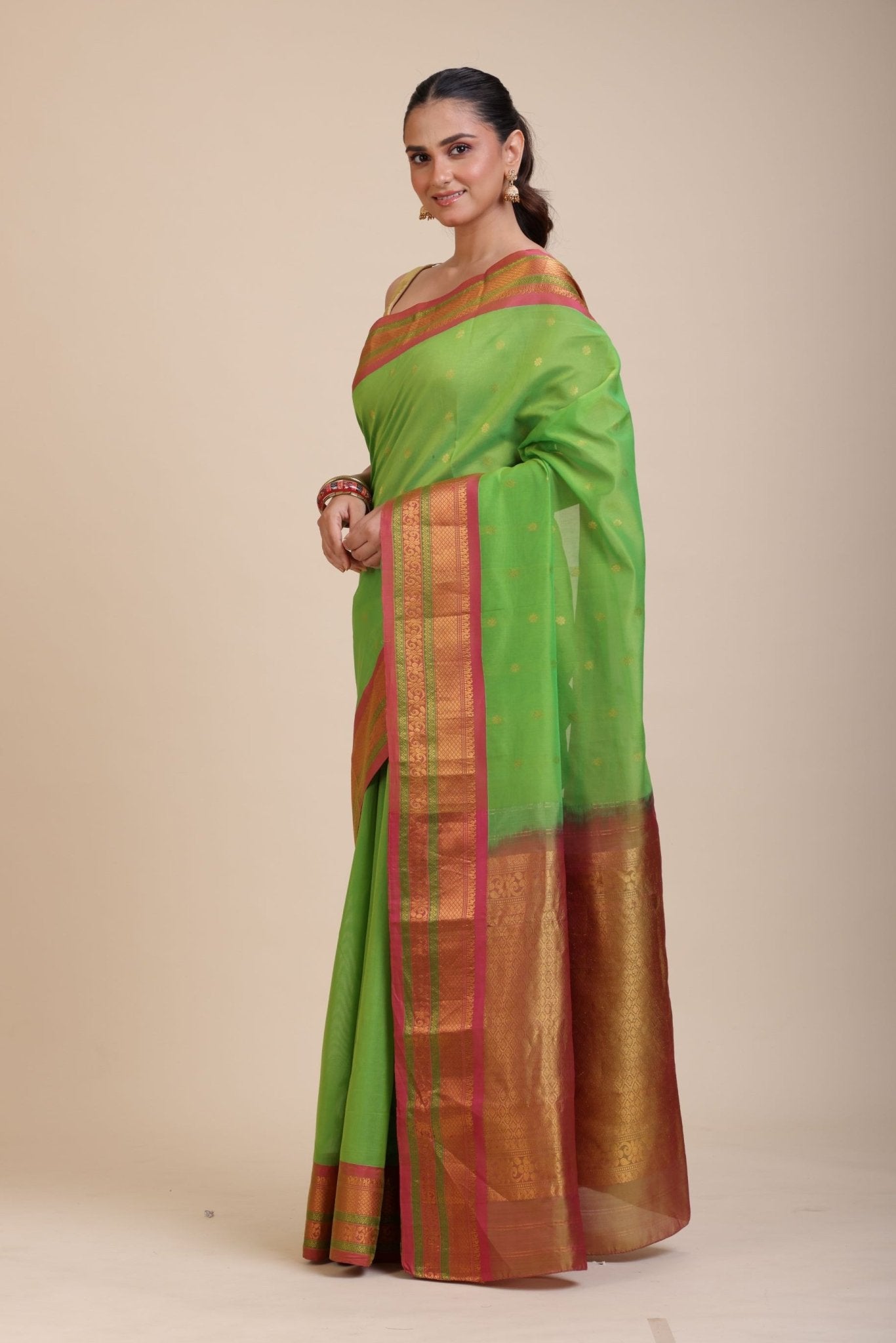 Green South Indian Silk Saree With PInk and Golden Border and Pallu - Anvi Couture