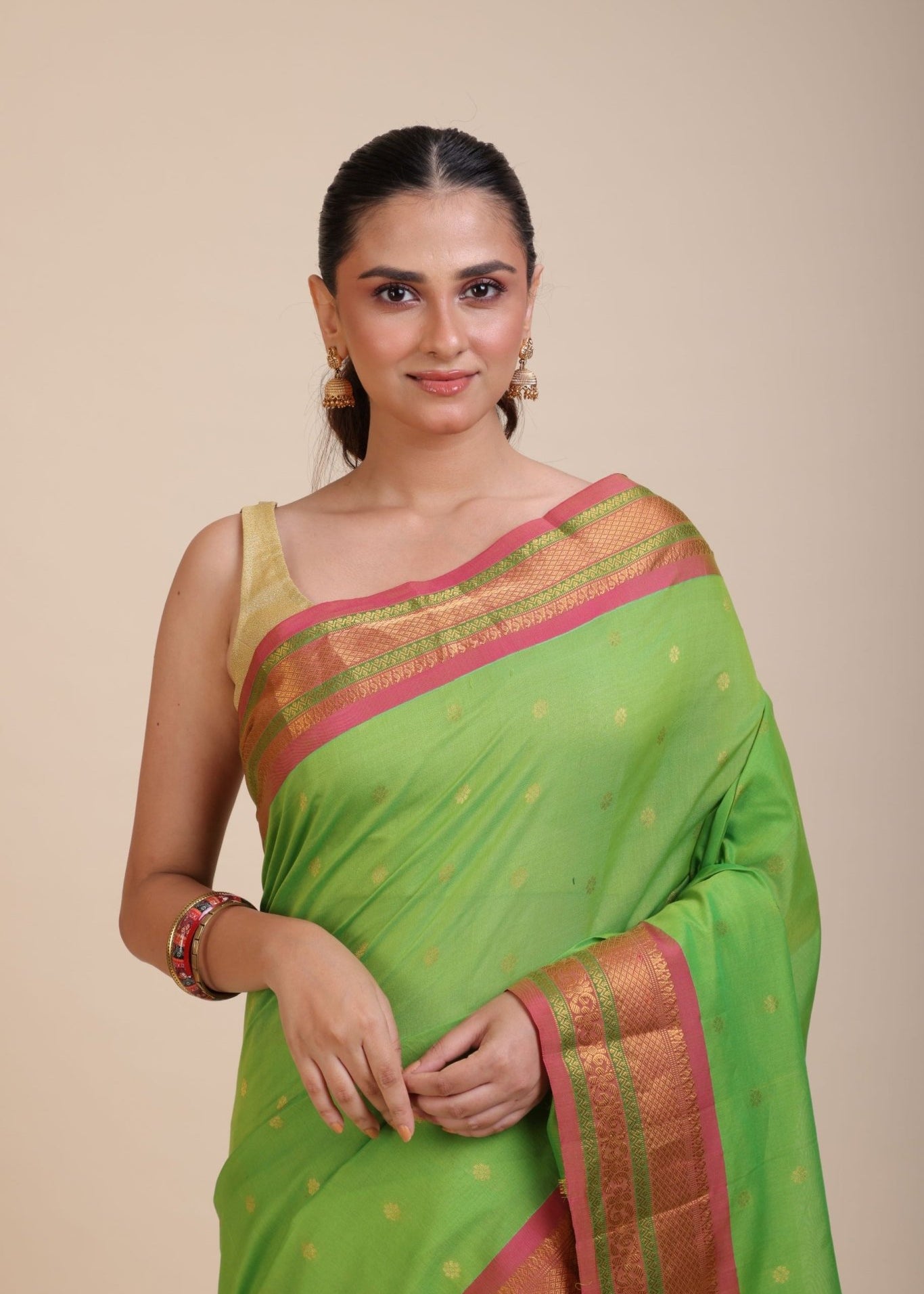 Green South Indian Silk Saree With PInk and Golden Border and Pallu - Anvi Couture