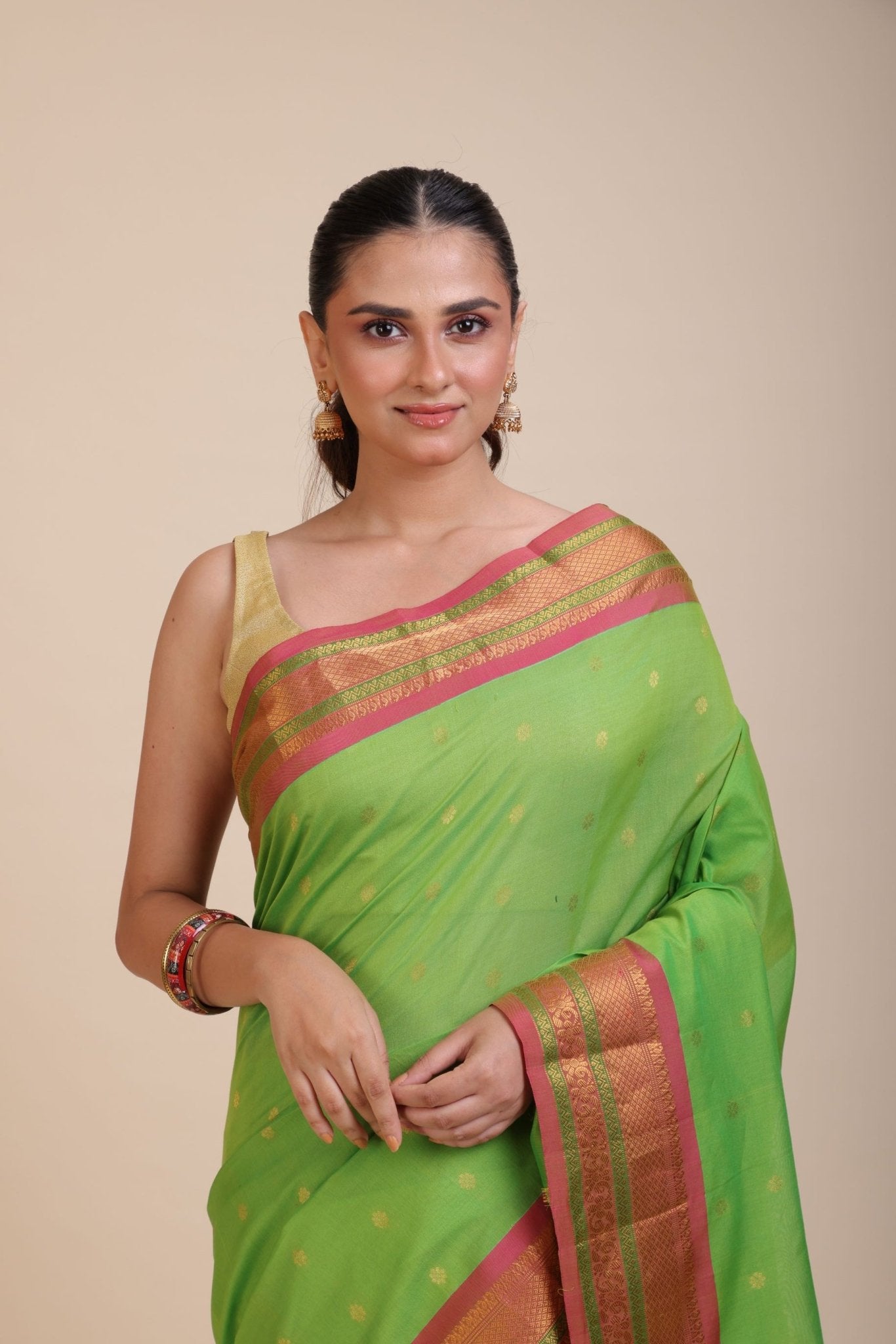 Green South Indian Silk Saree With PInk and Golden Border and Pallu - Anvi Couture