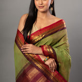 Green and Maroon Pure Cotton Gadwal Saree Close Up
