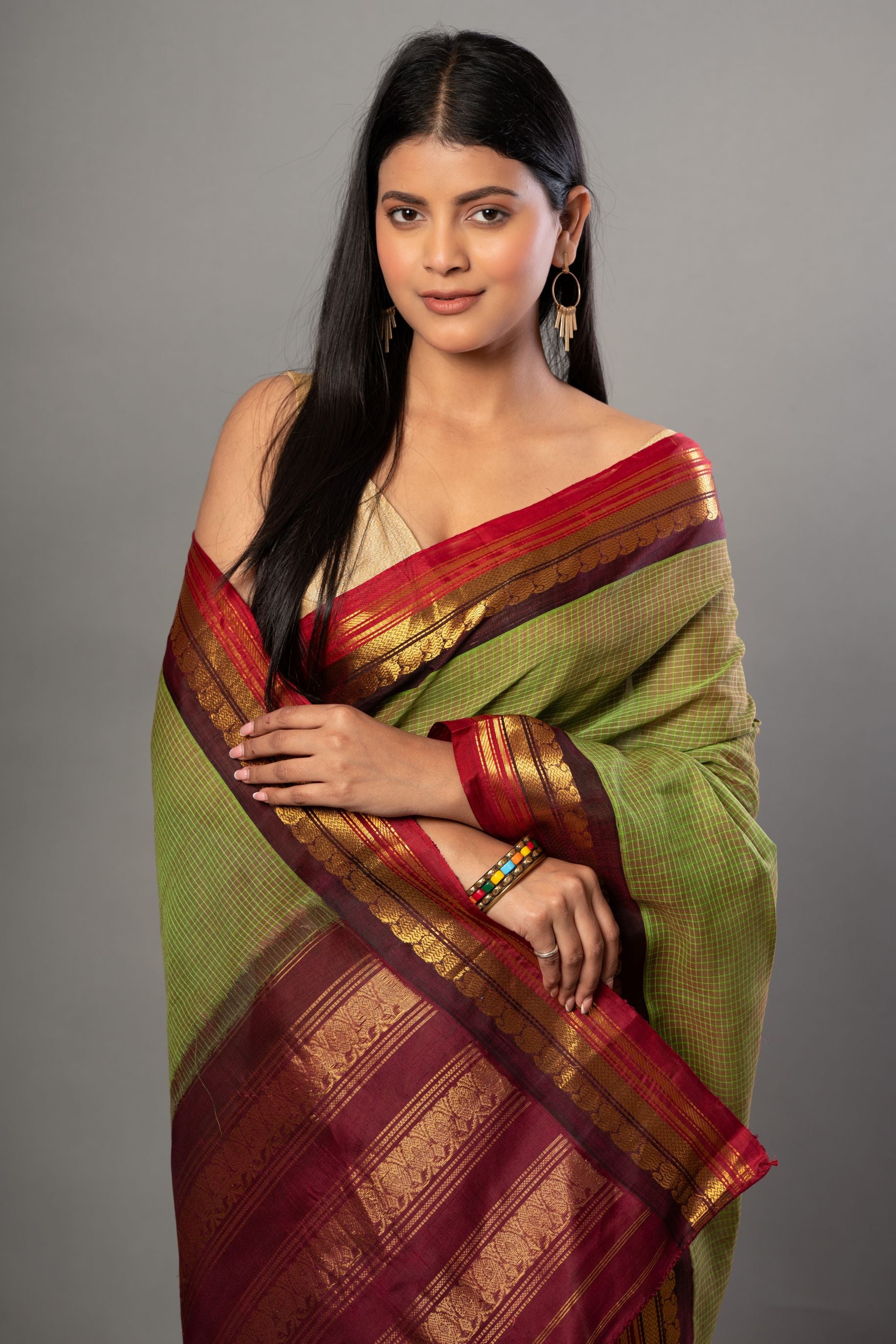 Green and Maroon Pure Cotton Gadwal Saree Close Up

