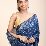 Indigo Handblock Printed Cotton Saree With Golden Border
close