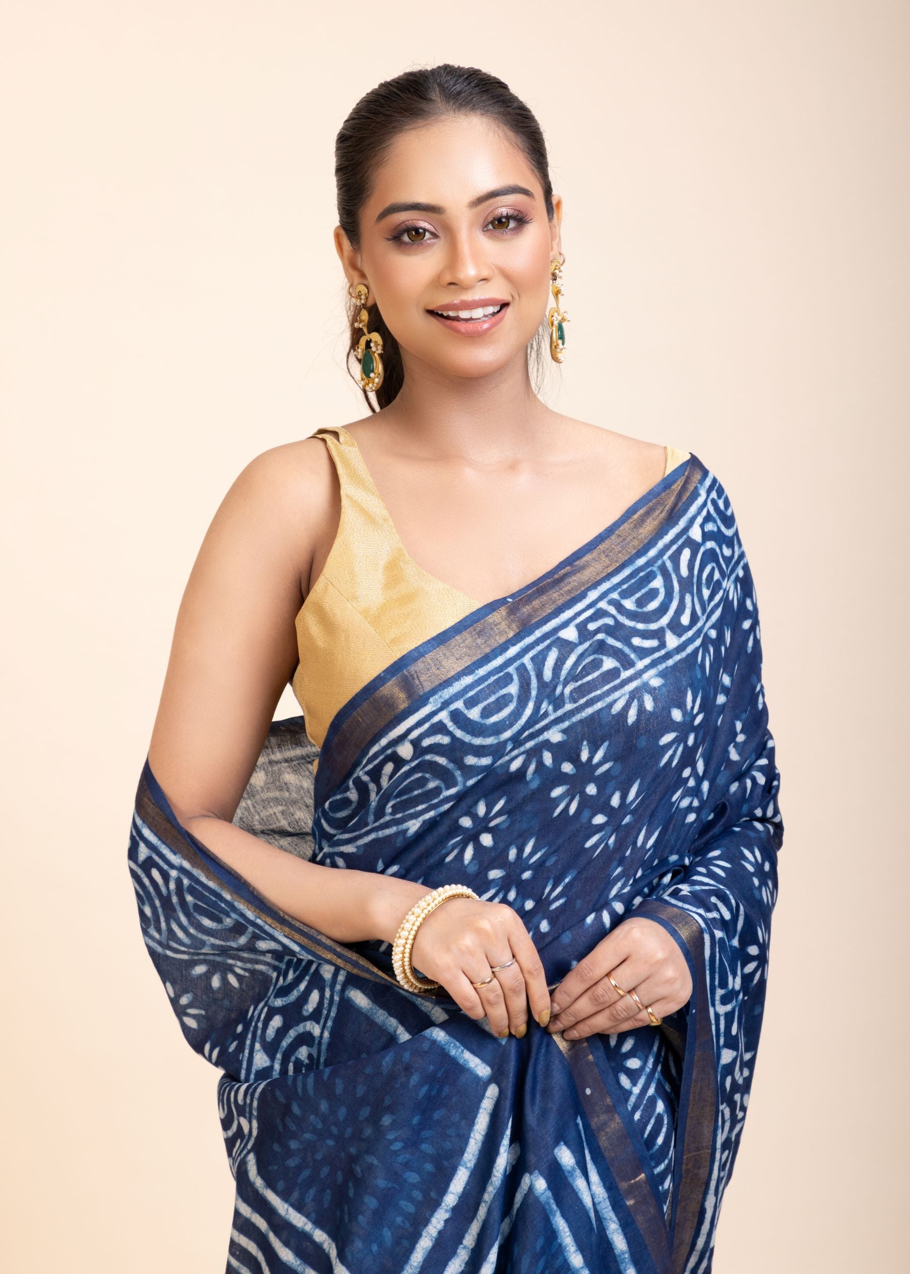 Indigo Handblock Printed Cotton Saree With Golden Border
close