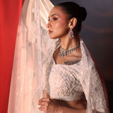 Ivory White Bridal Lehenga set in Pearl Hand Embroidery - Side