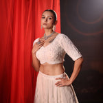 Ivory White Bridal Lehenga set in Pearl Hand Embroidery - Close