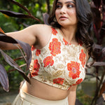 Ivory and Orange Floral Lehenga with Hand - Embroidered Cape - Anvi Couture