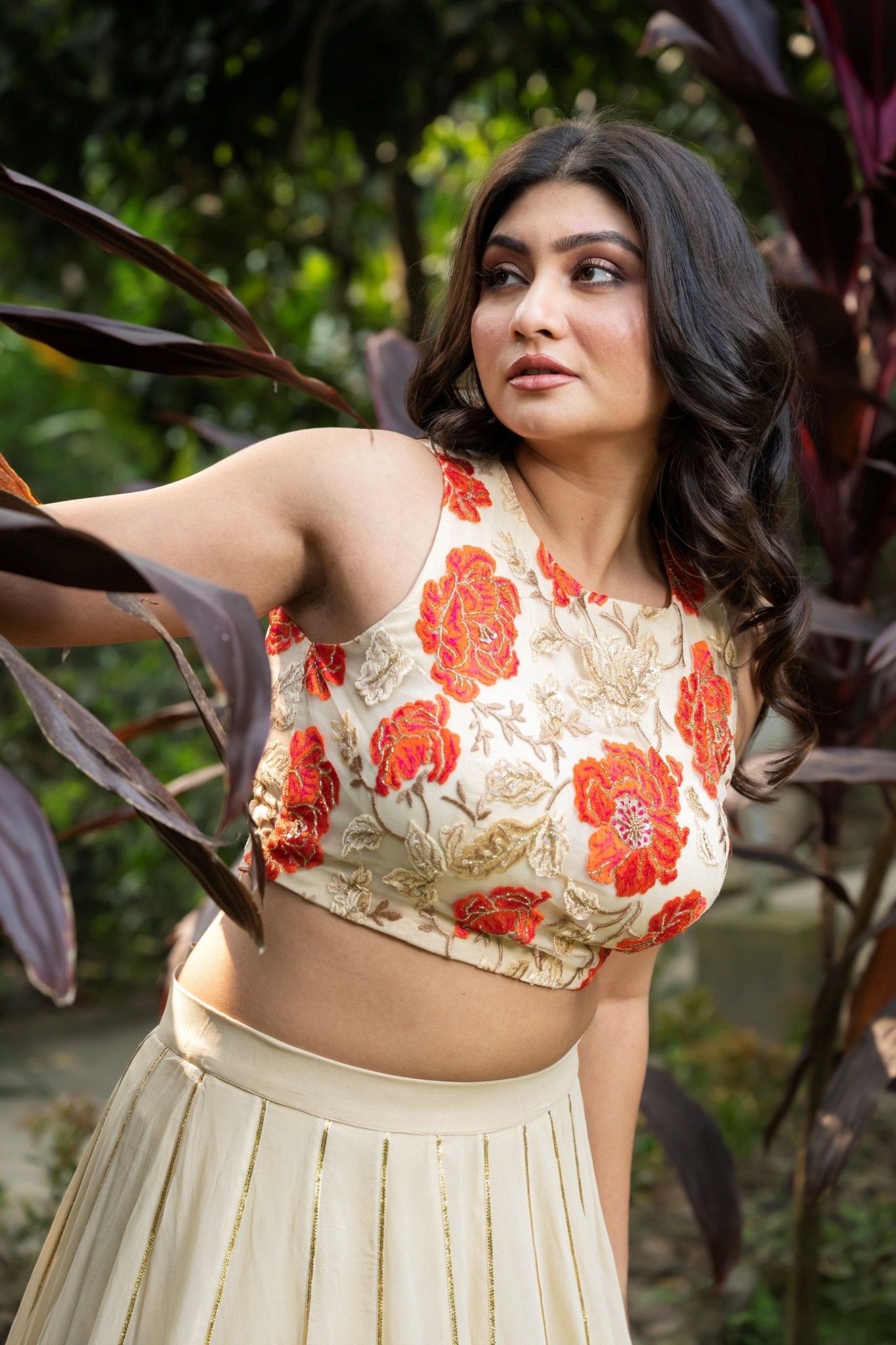 Ivory and Orange Floral Lehenga with Hand - Embroidered Cape - Anvi Couture