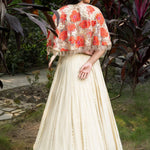 Ivory and Orange Floral Lehenga with Hand - Embroidered Cape - Anvi Couture