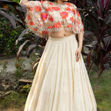 Ivory and Orange Floral Lehenga with Hand - Embroidered Cape - Anvi Couture