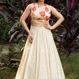 Ivory and Orange Floral Lehenga with Hand - Embroidered Cape - Anvi Couture