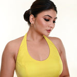 Lemon yellow organza halter neck saree blouse — front view — Anvi Couture