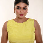 Lemon yellow satin sleeveless boat neck blouse — front view showing clean neckline