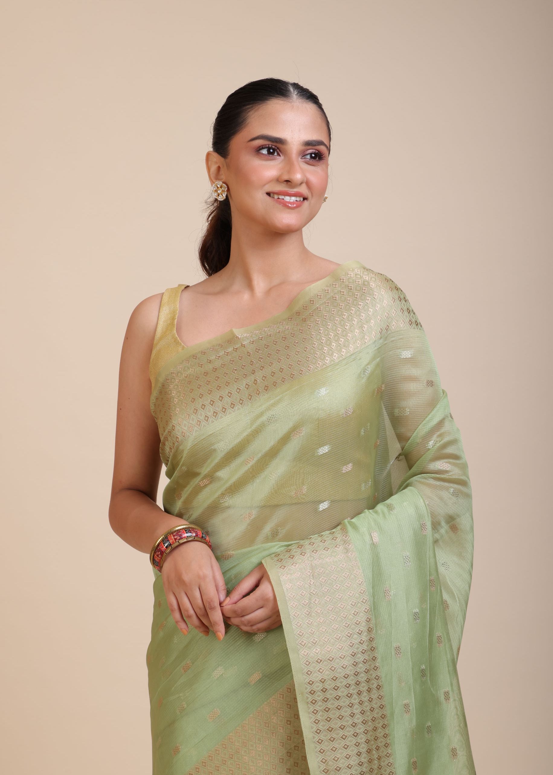Light Green Kota Silk Saree With Golden Border Close Up

