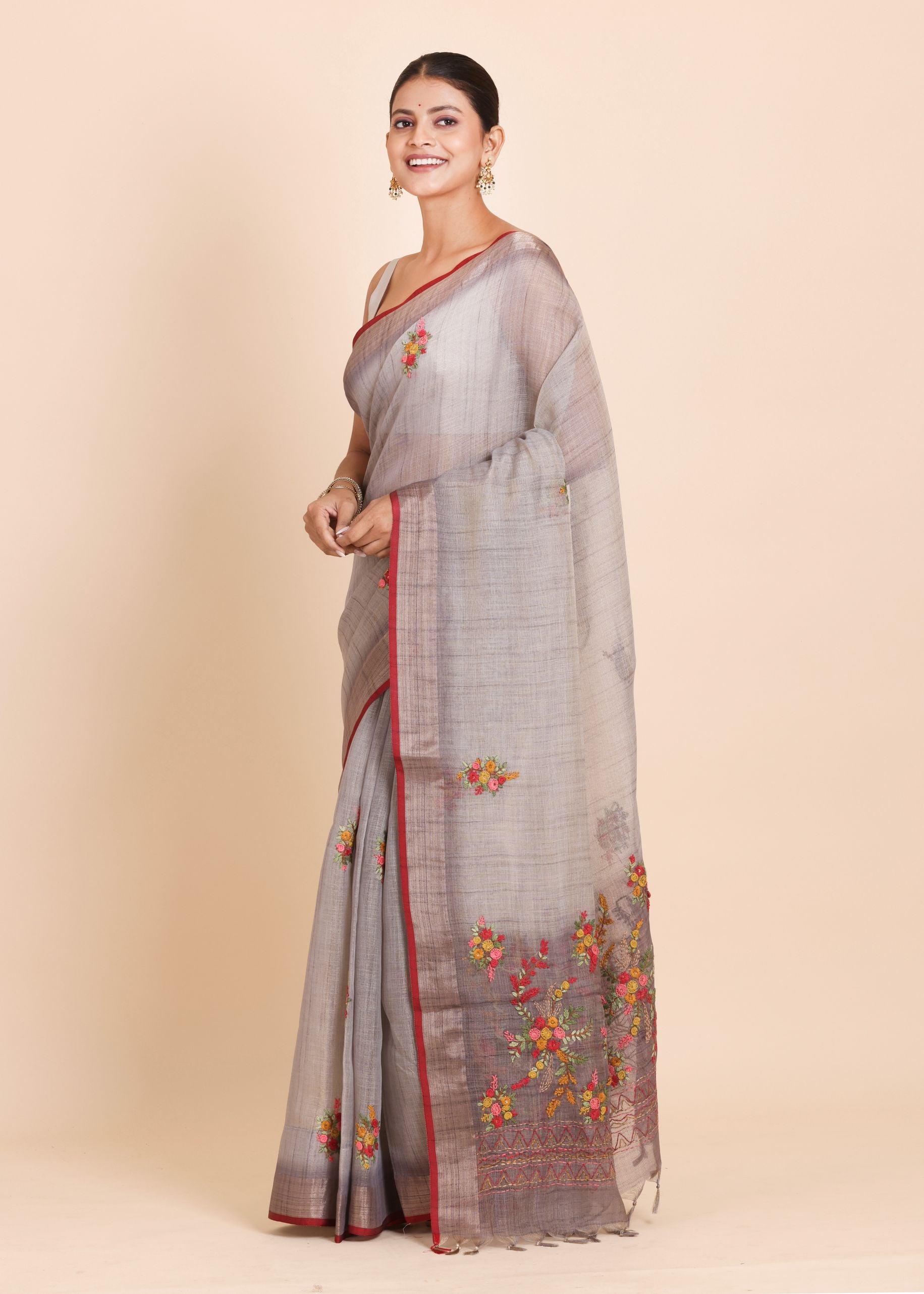 Light Grey Pure Lilen saree with Hand embroidered Floral Work Side