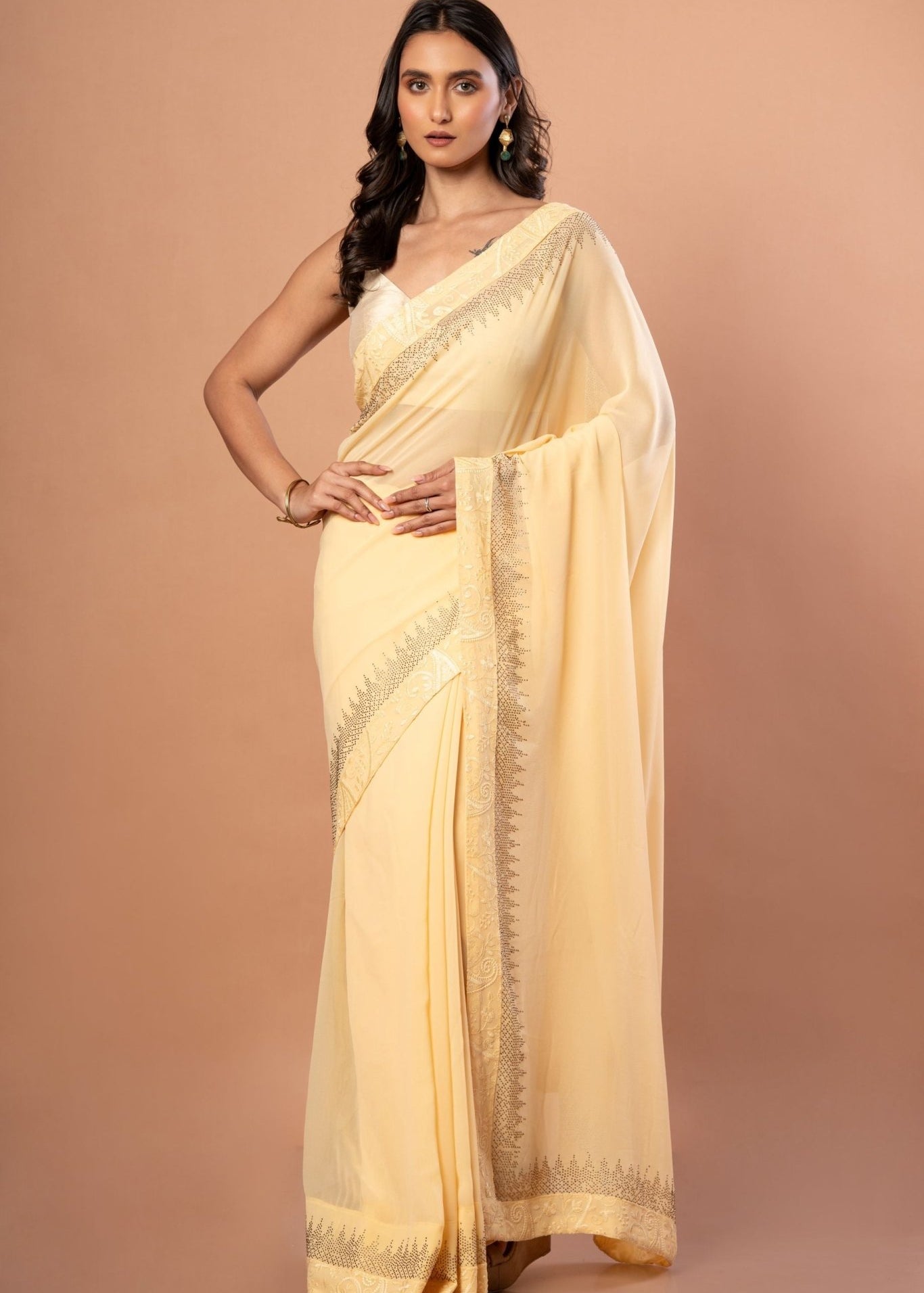 Light Yellow Georgette saree with sequin work - Anvi Couture