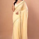 Light Yellow Georgette saree with sequin work - Anvi Couture