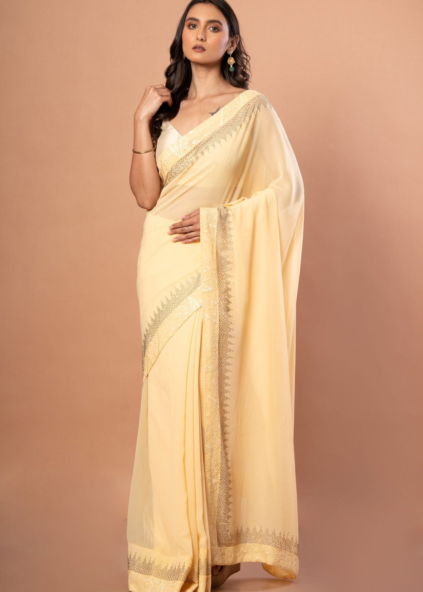 Light Yellow Georgette saree with sequin work - Anvi Couture