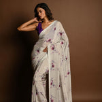 Light grey satin silk saree – pallu with floral print and sequin detailing