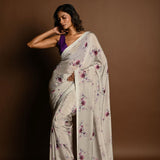 Light grey satin silk saree – pallu with floral print and sequin detailing