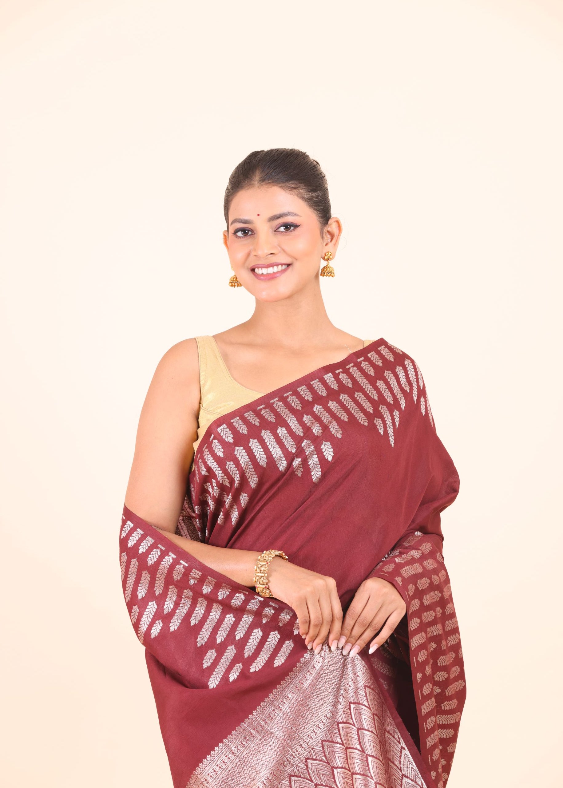 Maroon Dola Silk Saree with Silver Zari Woven Border and Pallu Close Up