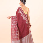 Maroon Dola Silk Saree with Silver Zari Woven Border and Pallu Back
