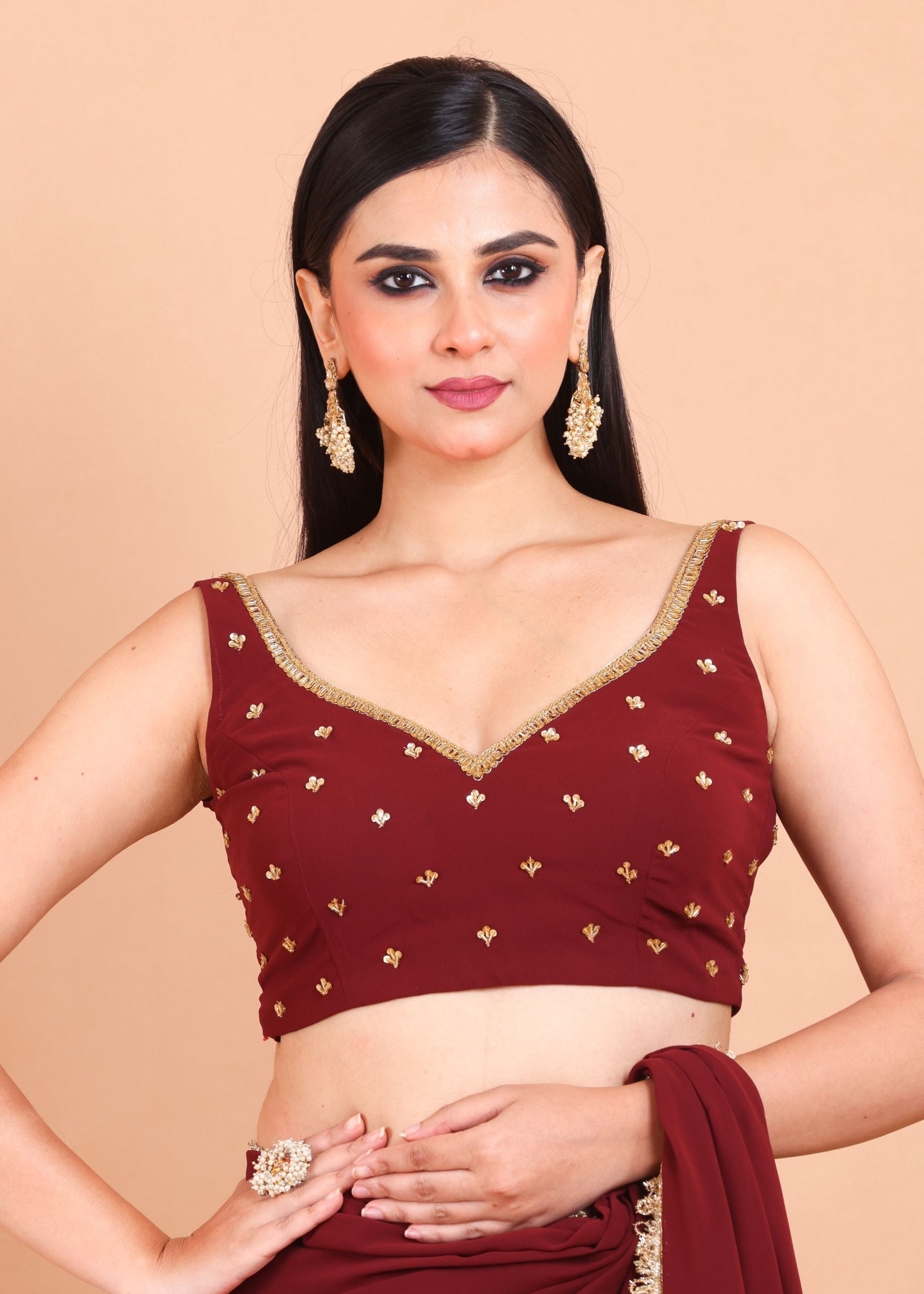 Maroon Georgette Saree Blouse Set  With Golden Embroidered Border and Cutdana Work blouse front View
