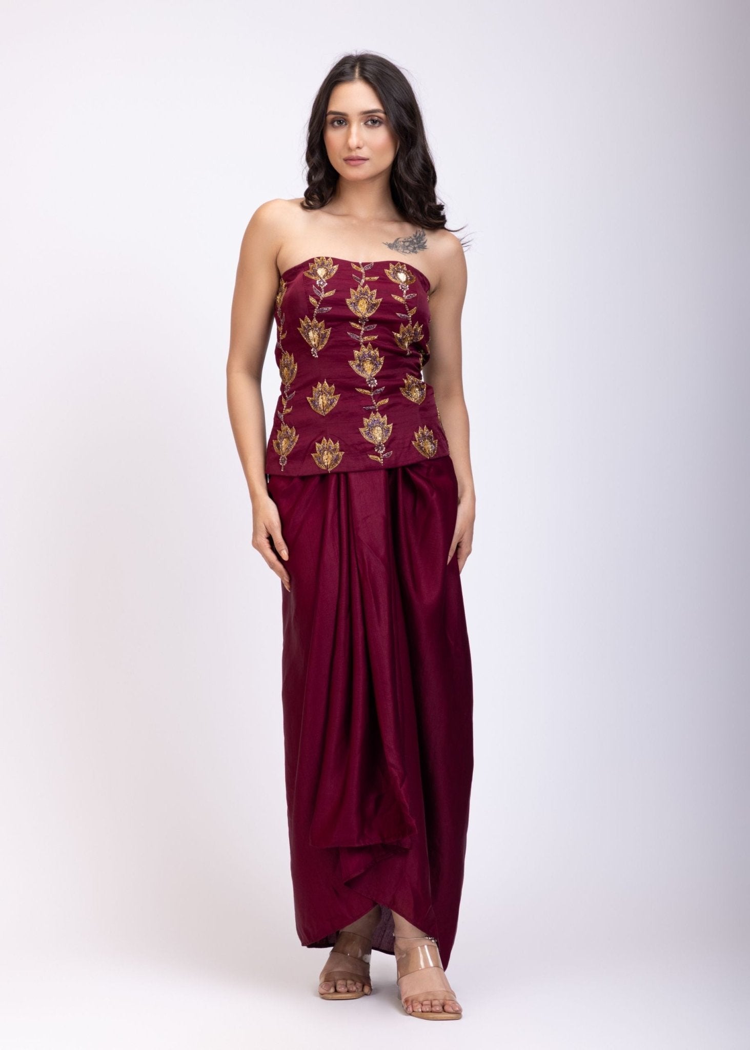 Maroon Off Shoulder Corset top with Gold Cutdana Detailing and Drape Skirt - Anvi Couture