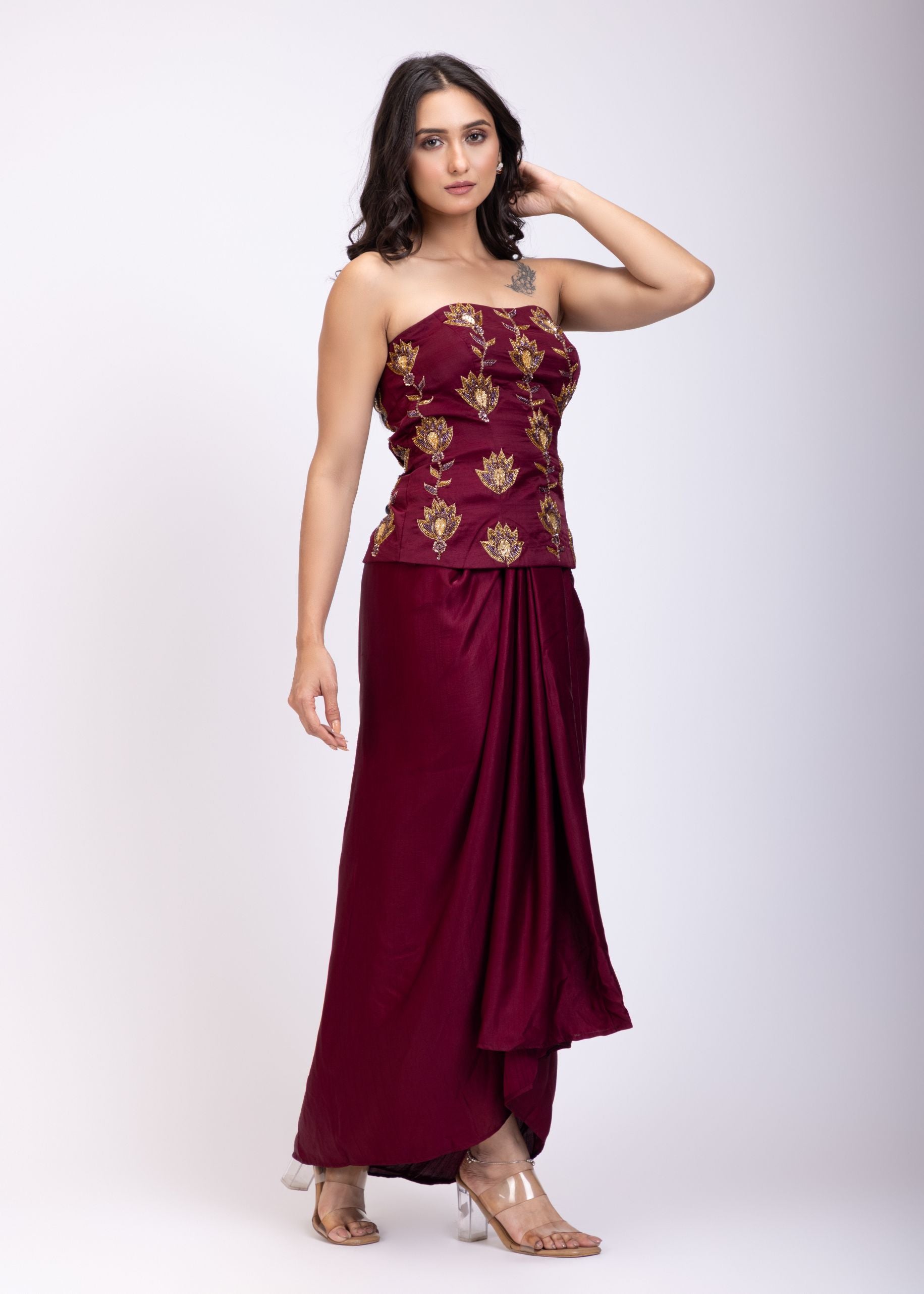 Maroon Off Shoulder Corset top with Gold Cutdana Detailing and Drape Skirt front